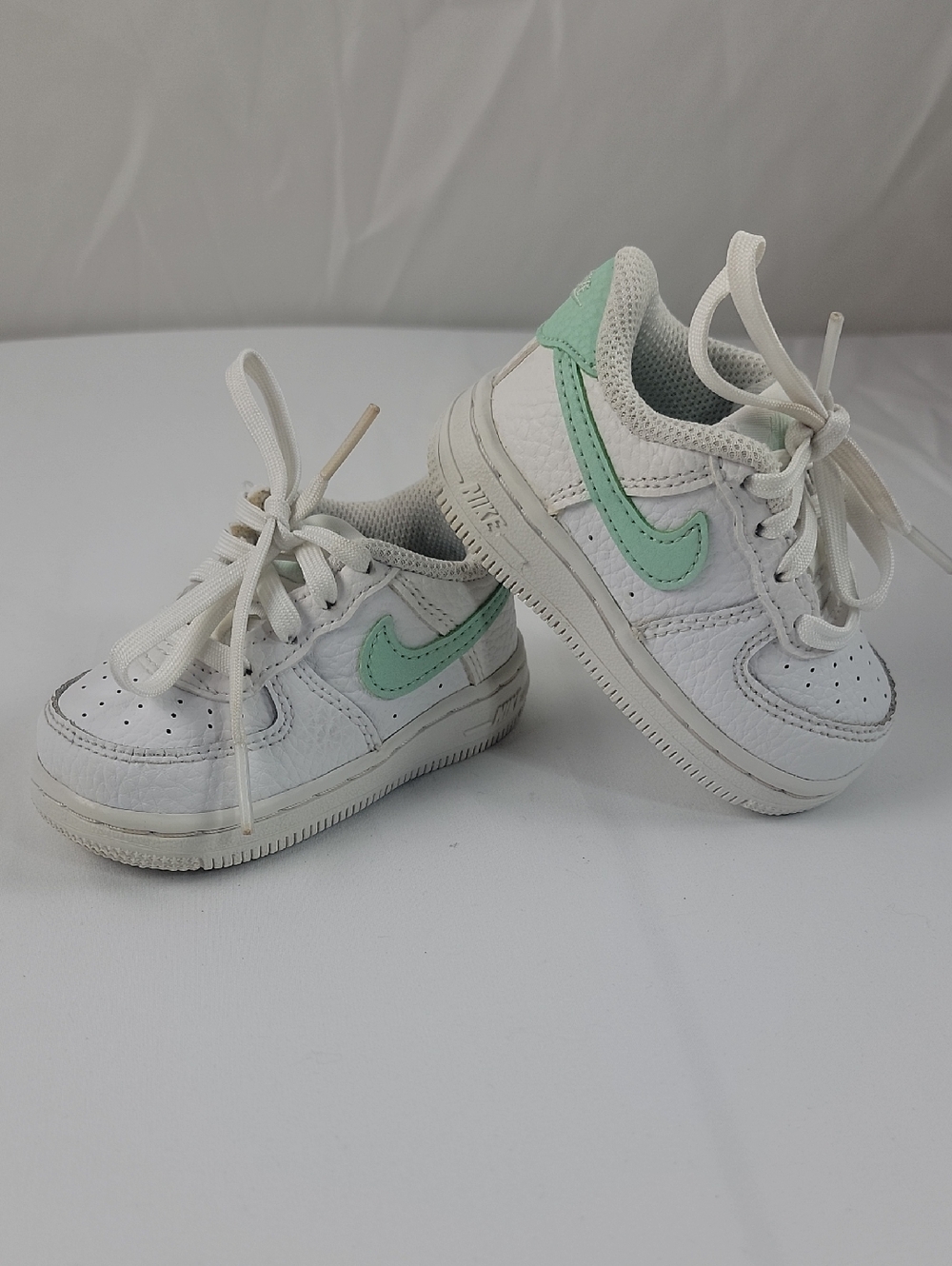 Nike Kids White Sneakers with Mint Green Swoosh
